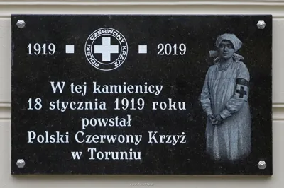 Tablica pamiątkowa Stulecia PCK w Toruniu