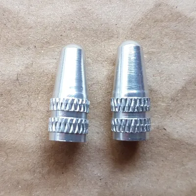 Kapturek nakrętka zaworu PRESTA aluminiowy Srebrny ochronny i ozdobny na wentyl rowerowy